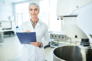 a woman in a white coat holding a clipboard - Catering Officer Catering Supervisor, 3Q Recruitment in Kitchen