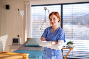 Staff Nurse - County Carlow 3 Smiling nurse with a hospital background. Staff Clinical Nurse. Permanent Recruitment. Staff Nurse Jobs Ireland